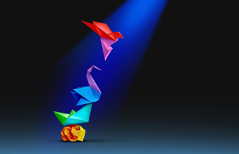 A beautiful visual metaphor for transformation—from a crumpled ball of paper to a bird in flight
